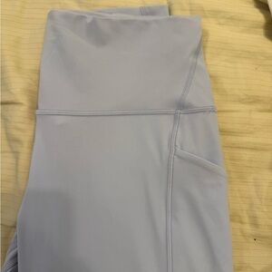Lululemon Light blue Gray Active Leggings with pockets. Never worn. Size 8